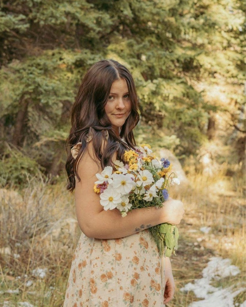 Cassidy smiling outdoors