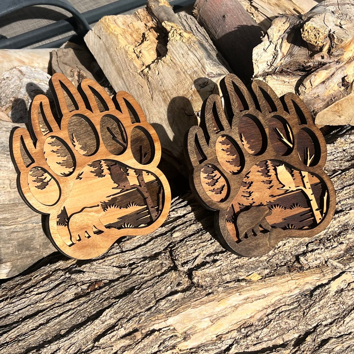Bear Paw — layered wood art in two finishes