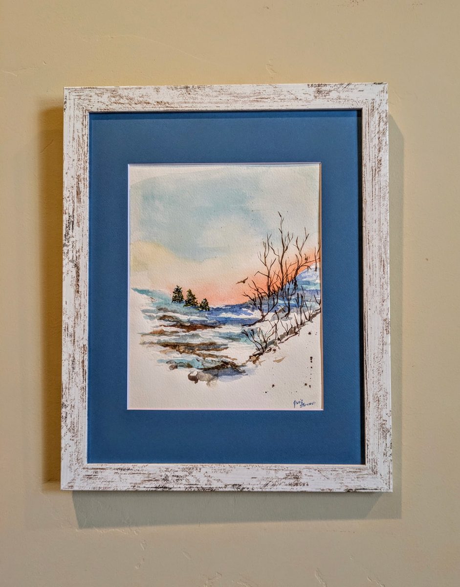 Winter — framed watercolor of a snowy sunset landscape
